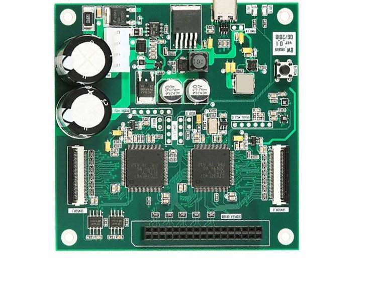 A densely built board with two round white components, ribbon-cable connectors and a long pin header