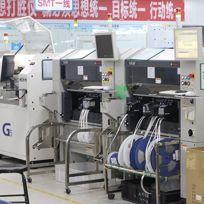 Pick-and-place machine with tape feeders loaded from reels at Hongrong