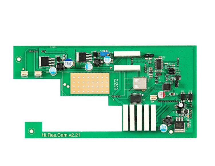 A camera board with a gold-plated antenna area, four ribbon-cable strips and small surface-mount parts
